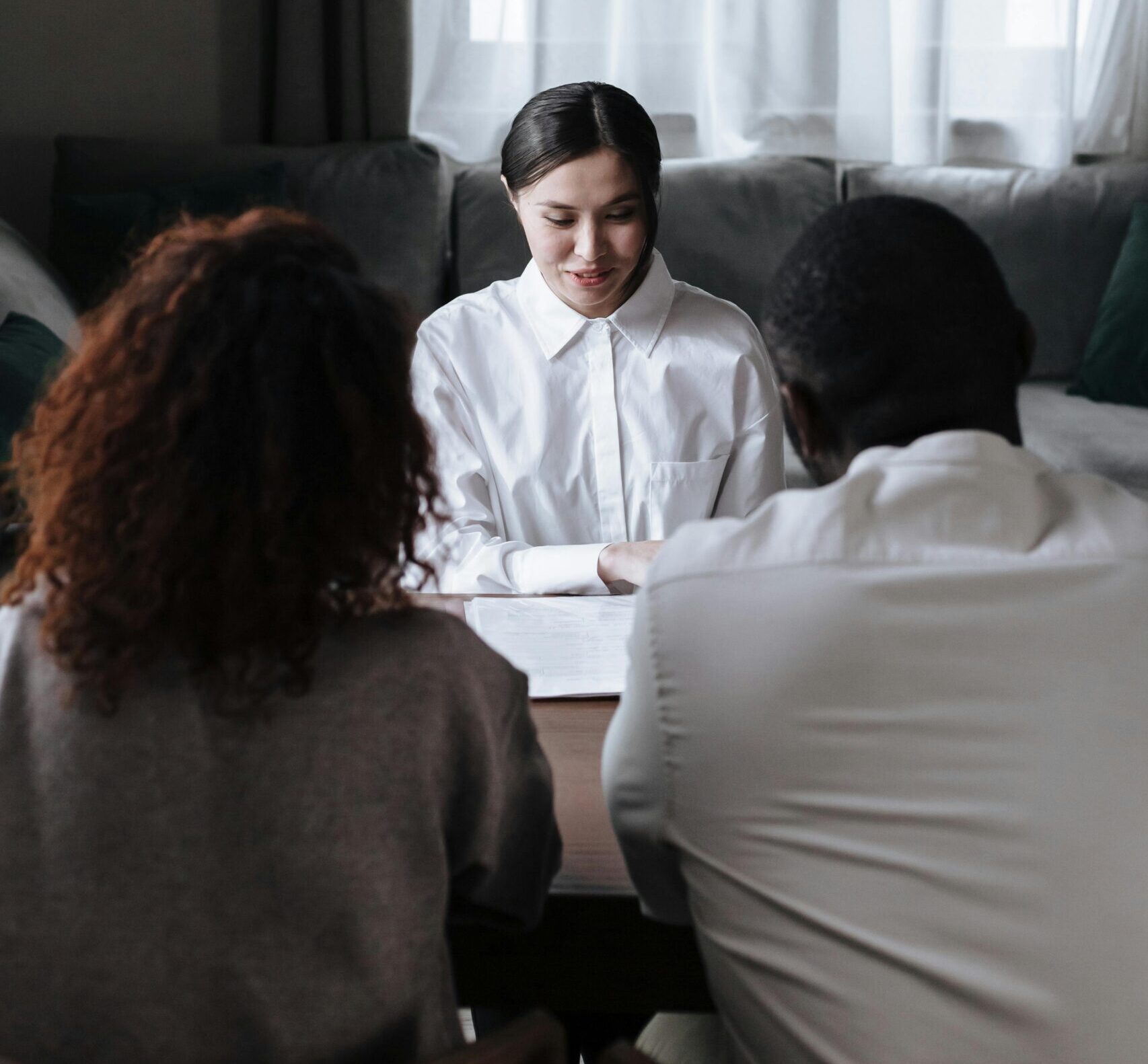 Social Worker Sitting Opposite Couple